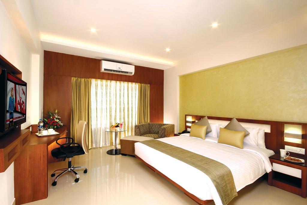 Hotel Chrysoberyl Kottayam Rom bilde